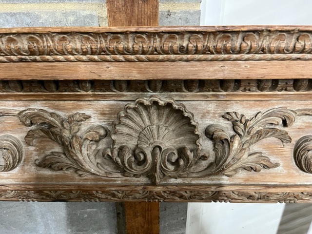 A Georgian carved pine fire surround, width 143cm, height 135cm (aperture width 96cm, height 105cm)